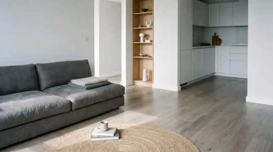 Modern leasehold apartment interior with personal belongings and fixtures showing the distinction between building and contents coverage